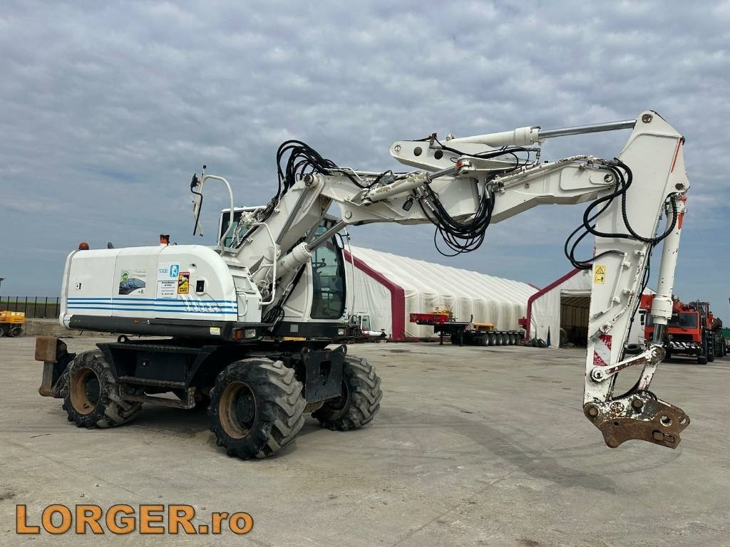 Hitachi ZX 140 W-3 - Máy xúc bánh lốp: hình 1 Hitachi ZX 140 W-3 - Máy xúc bánh lốp: hình 1