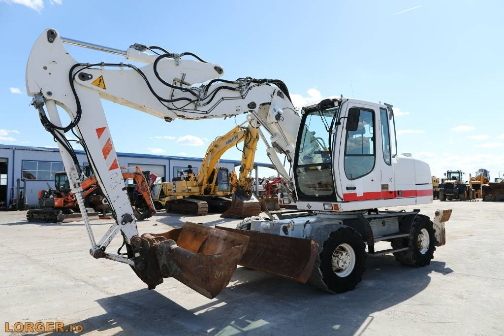 Liebherr A 314 - Máy xúc bánh lốp: hình 1 Liebherr A 314 - Máy xúc bánh lốp: hình 1