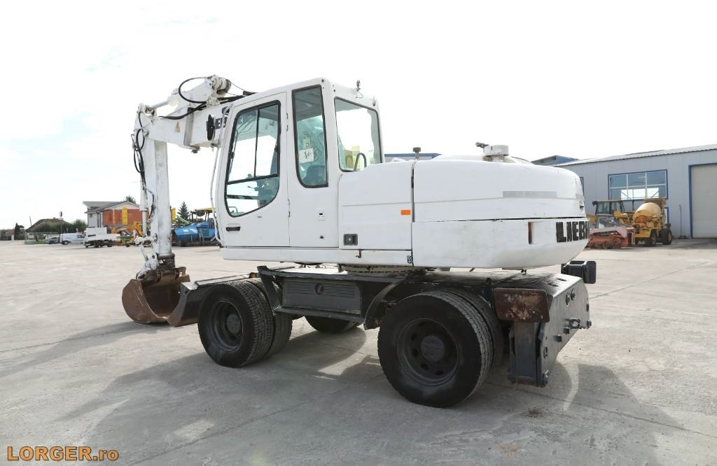 Liebherr A 316 Litronic - Máy xúc bánh lốp: hình 2 Liebherr A 316 Litronic - Máy xúc bánh lốp: hình 2