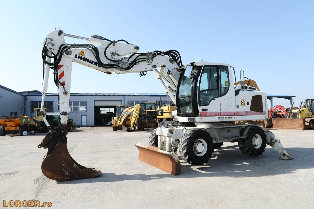 Liebherr A 914 - Máy xúc bánh lốp: hình 4 Liebherr A 914 - Máy xúc bánh lốp: hình 4