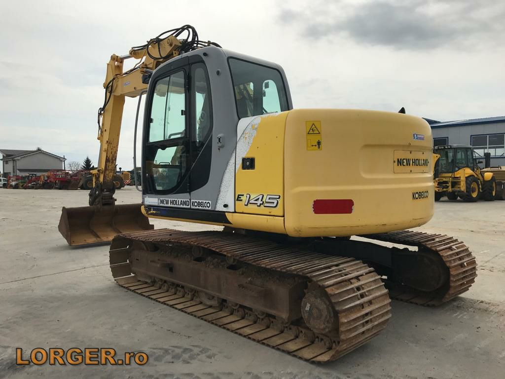 New Holland E 145 - Máy xúc bánh xích: hình 4 New Holland E 145 - Máy xúc bánh xích: hình 4