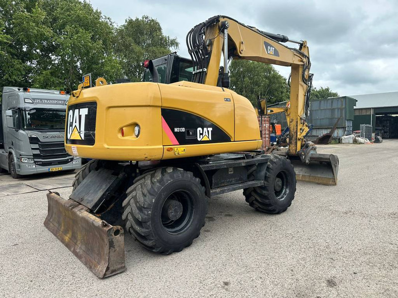 Cat M 313 D - Máy xúc bánh lốp: hình 5 Cat M 313 D - Máy xúc bánh lốp: hình 5