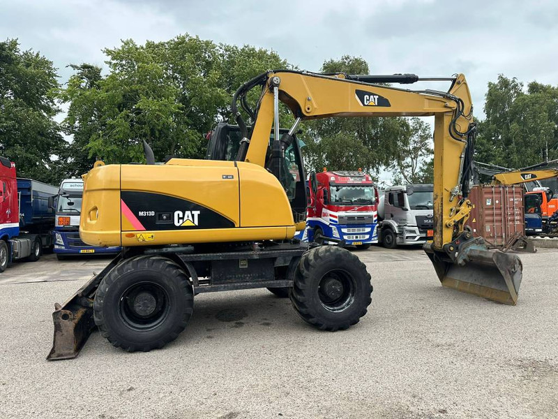 Cat M 313 D - Máy xúc bánh lốp: hình 4 Cat M 313 D - Máy xúc bánh lốp: hình 4