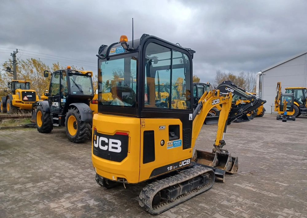 JCB 19C-1 - Máy xúc bánh xích: hình 4 JCB 19C-1 - Máy xúc bánh xích: hình 4