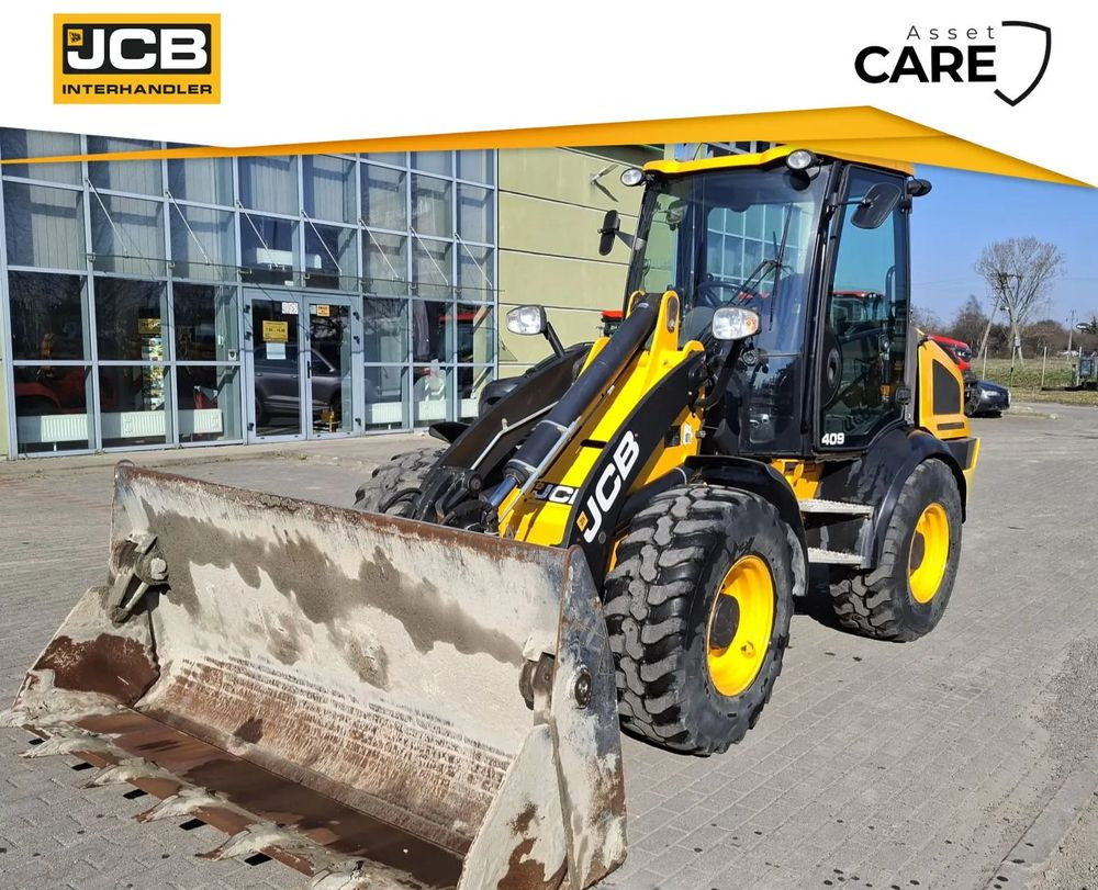 JCB 409 - Máy xúc bánh lốp: hình 1 JCB 409 - Máy xúc bánh lốp: hình 1