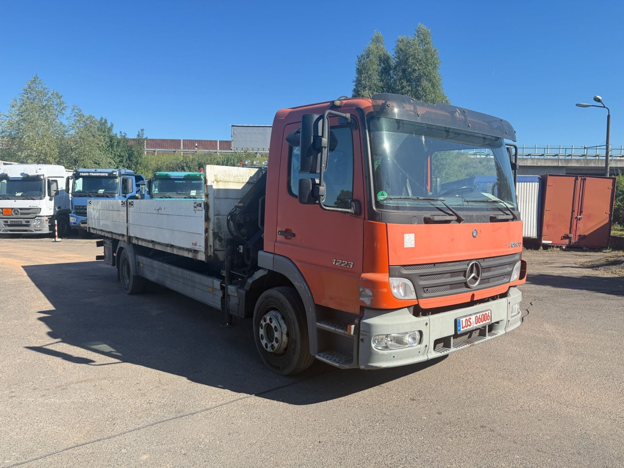 Mercedes-Benz Atego 1223 mit Kran MKG HLK 76 - Xe tải thùng lửng/ Phẳng, Xe cẩu tự hành: hình 2 Mercedes-Benz Atego 1223 mit Kran MKG HLK 76 - Xe tải thùng lửng/ Phẳng, Xe cẩu tự hành: hình 2