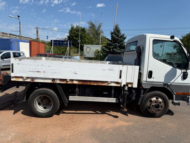 Mitsubishi Intercooler Canter - Xe ben nhỏ: hình 3 Mitsubishi Intercooler Canter - Xe ben nhỏ: hình 3