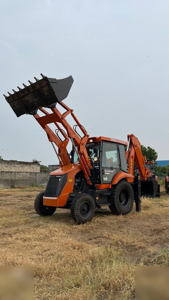 TATA HITACHI SHINRAI PRIME - Máy xúc trước múc sau: hình 1 TATA HITACHI SHINRAI PRIME - Máy xúc trước múc sau: hình 1