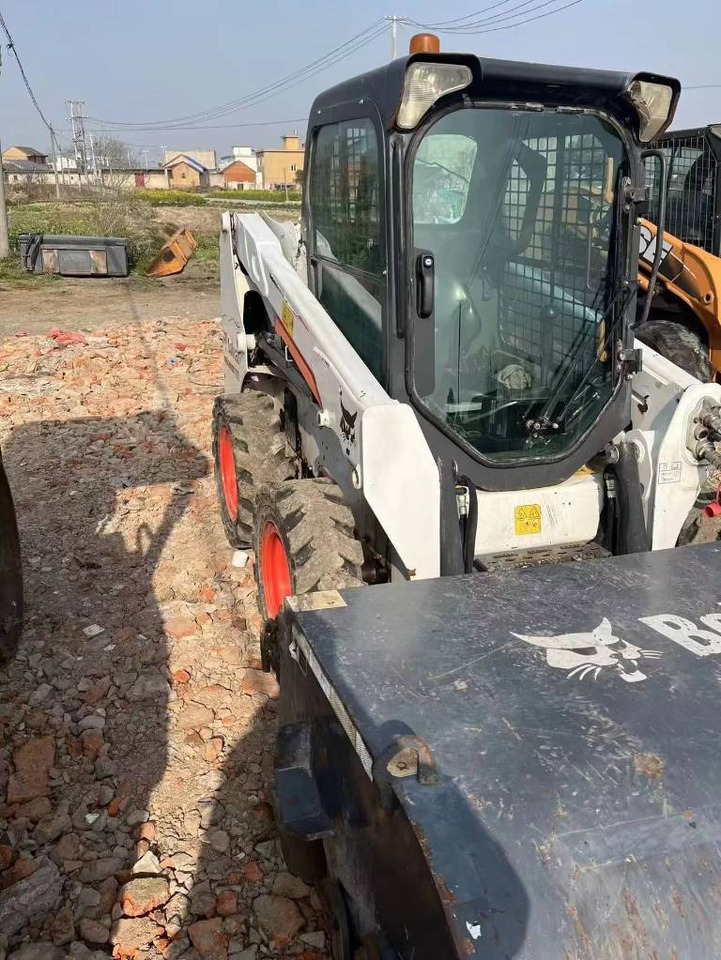 Bobcat S 550 - Máy xúc lật bánh lốp: hình 5 Bobcat S 550 - Máy xúc lật bánh lốp: hình 5
