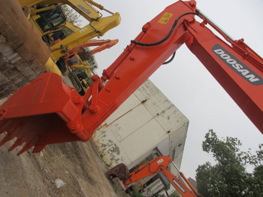 Doosan DH 150 LC-7 - Máy xúc bánh lốp: hình 2 Doosan DH 150 LC-7 - Máy xúc bánh lốp: hình 2