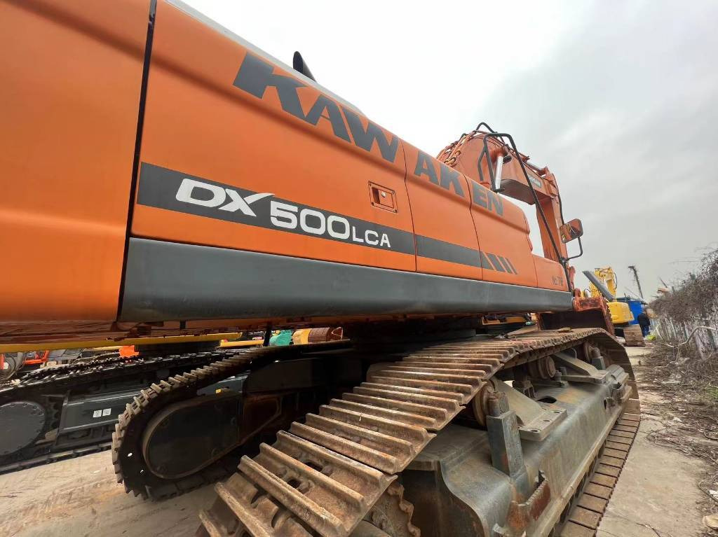 Doosan DX 500 LCA - Máy xúc bánh xích: hình 3 Doosan DX 500 LCA - Máy xúc bánh xích: hình 3