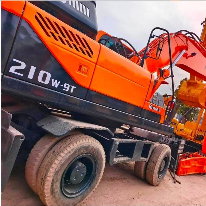 Hyundai 210 W-9 - Máy xúc bánh lốp: hình 4 Hyundai 210 W-9 - Máy xúc bánh lốp: hình 4