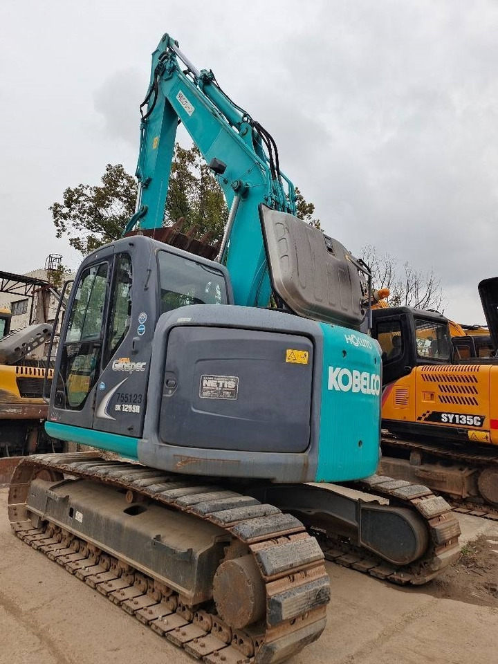 Kobelco SK 125 - Máy xúc bánh xích: hình 1 Kobelco SK 125 - Máy xúc bánh xích: hình 1