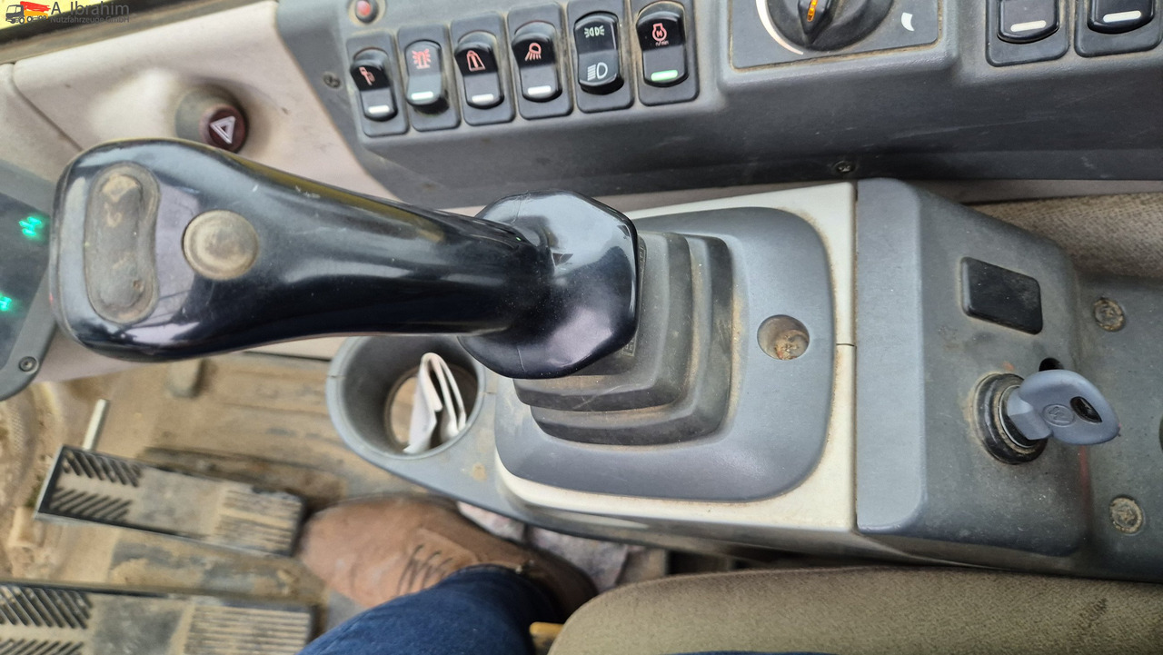 New Holland MH 2.6 Zustand gut, deutsche Maschine incl. Greifer und Dreservo - Máy xúc bánh lốp: hình 3 New Holland MH 2.6 Zustand gut, deutsche Maschine incl. Greifer und Dreservo - Máy xúc bánh lốp: hình 3