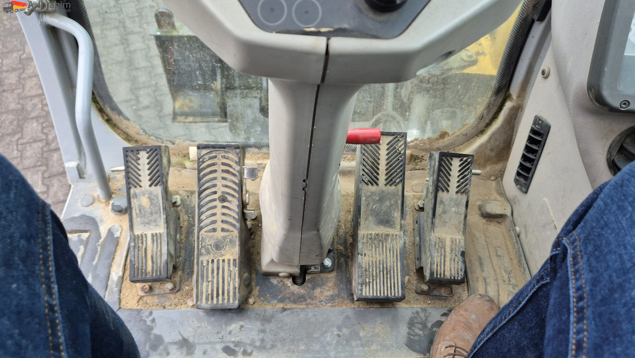 New Holland MH 2.6 Zustand gut, deutsche Maschine incl. Greifer und Dreservo - Máy xúc bánh lốp: hình 5 New Holland MH 2.6 Zustand gut, deutsche Maschine incl. Greifer und Dreservo - Máy xúc bánh lốp: hình 5