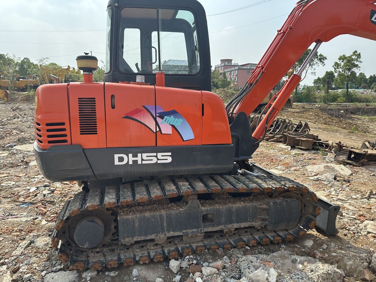 Doosan DH55 - Máy xúc bánh xích: hình 3 Doosan DH55 - Máy xúc bánh xích: hình 3
