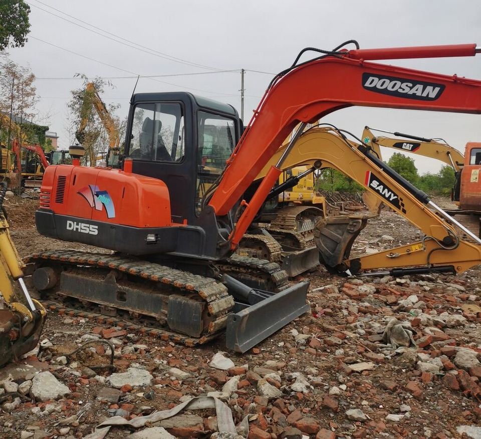 Doosan DH55 - Máy xúc bánh xích: hình 5 Doosan DH55 - Máy xúc bánh xích: hình 5