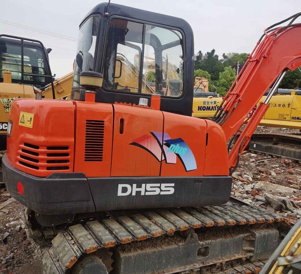 Doosan DH55 - Máy xúc bánh xích: hình 1 Doosan DH55 - Máy xúc bánh xích: hình 1