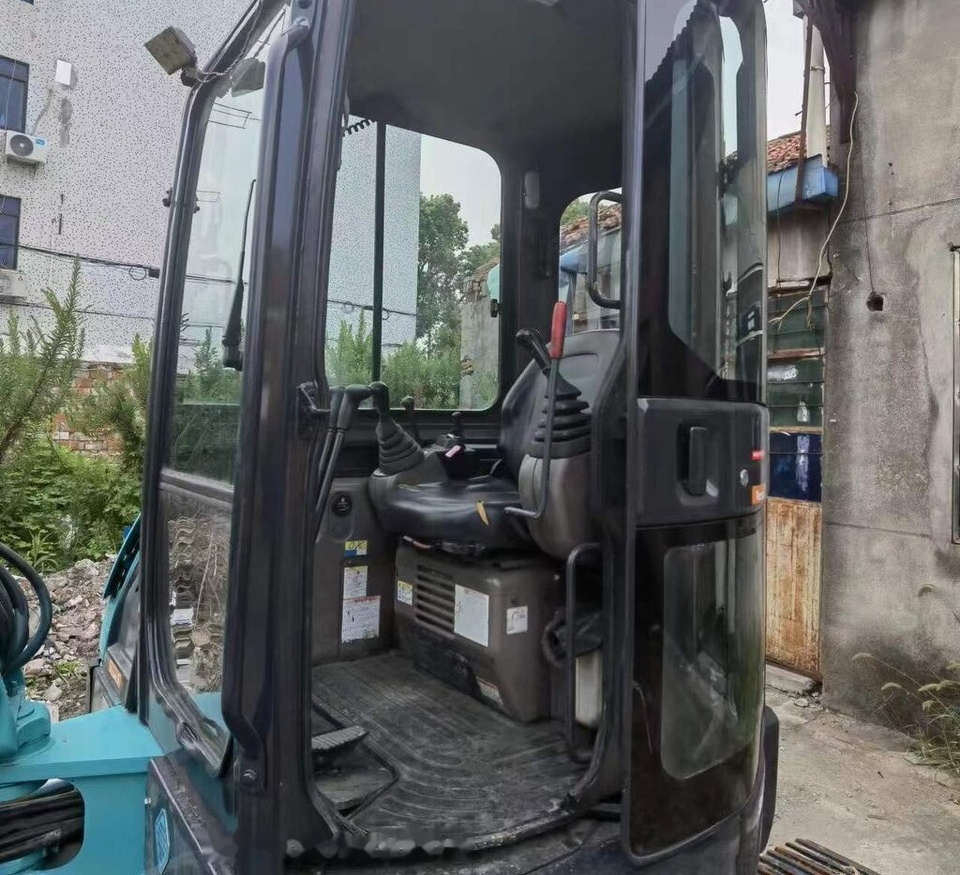 Kobelco SK55 - Máy xúc bánh xích: hình 1 Kobelco SK55 - Máy xúc bánh xích: hình 1