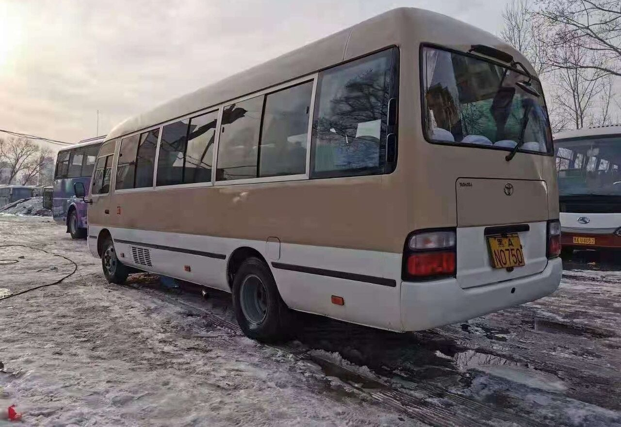 Toyota Coaster - Xe bus ngoại ô: hình 1 Toyota Coaster - Xe bus ngoại ô: hình 1