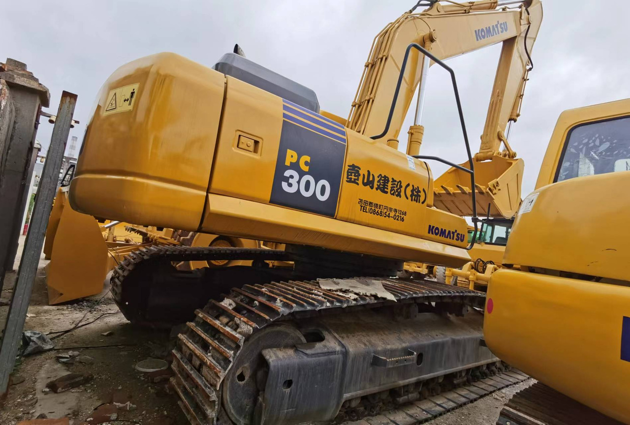 KOMATSU PC300-7 - Máy xúc bánh xích: hình 1 KOMATSU PC300-7 - Máy xúc bánh xích: hình 1