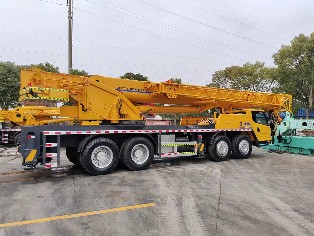 XCMG QY75K - Cẩu bánh lốp: hình 1 XCMG QY75K - Cẩu bánh lốp: hình 1
