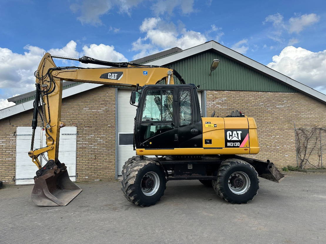 Caterpillar M313D - Máy xúc bánh lốp: hình 1 Caterpillar M313D - Máy xúc bánh lốp: hình 1