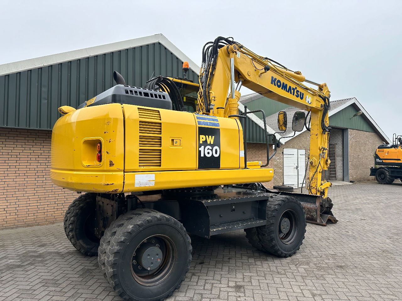 Komatsu PW160-8 - Máy xúc bánh lốp: hình 5 Komatsu PW160-8 - Máy xúc bánh lốp: hình 5
