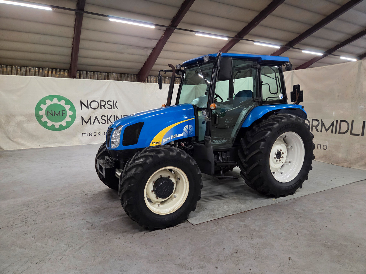 New Holland T5060 #Fin 1 eiers traktor - Máy cày: hình 1 New Holland T5060 #Fin 1 eiers traktor - Máy cày: hình 1