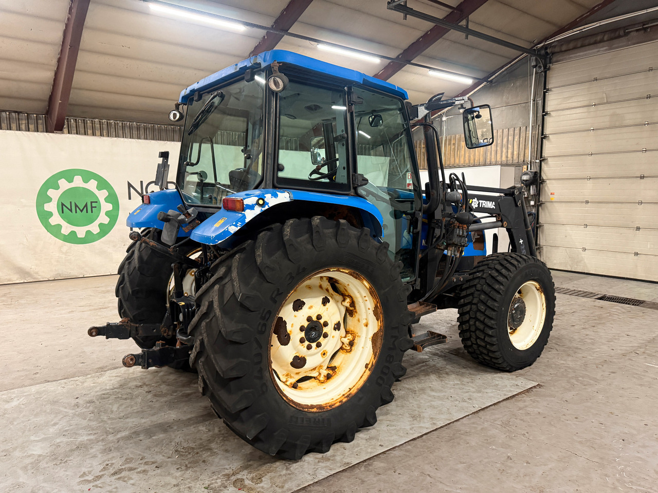 New Holland T5060 - Máy cày: hình 5 New Holland T5060 - Máy cày: hình 5