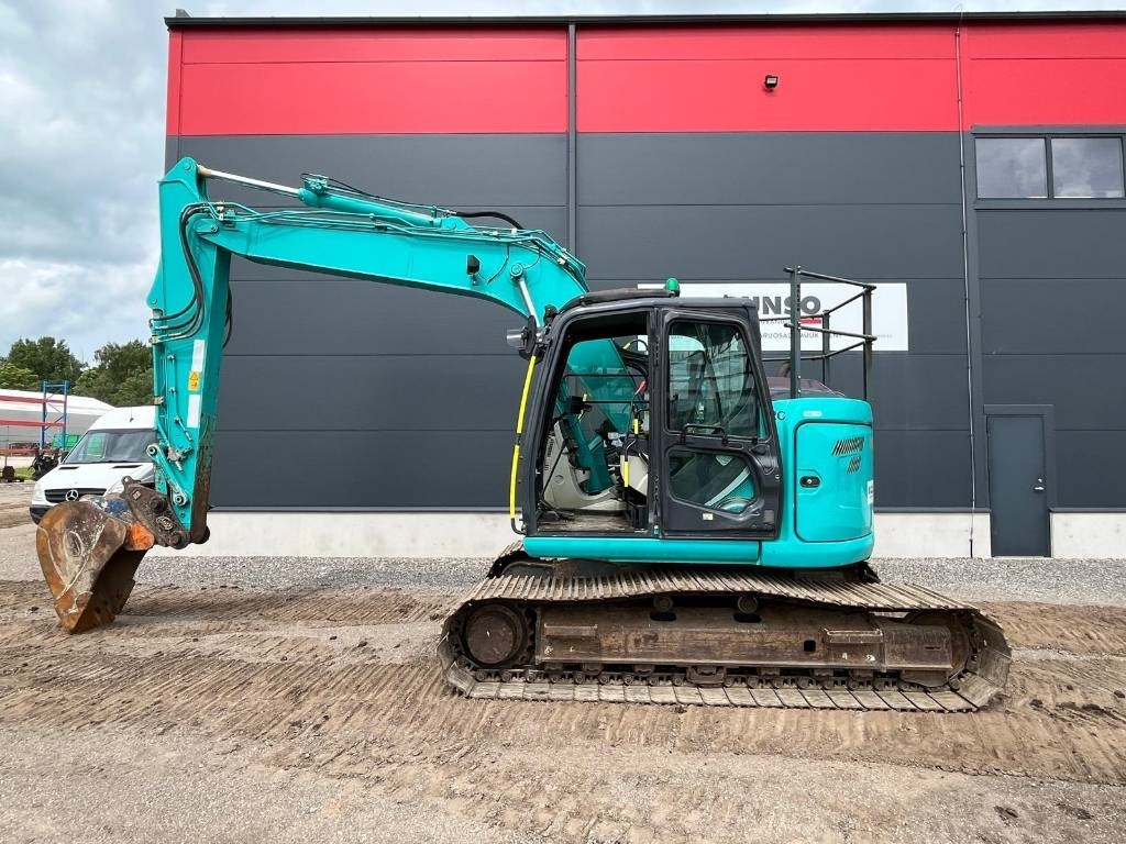Kobelco SK 140 SRLC-5 - Máy xúc bánh xích: hình 1 Kobelco SK 140 SRLC-5 - Máy xúc bánh xích: hình 1