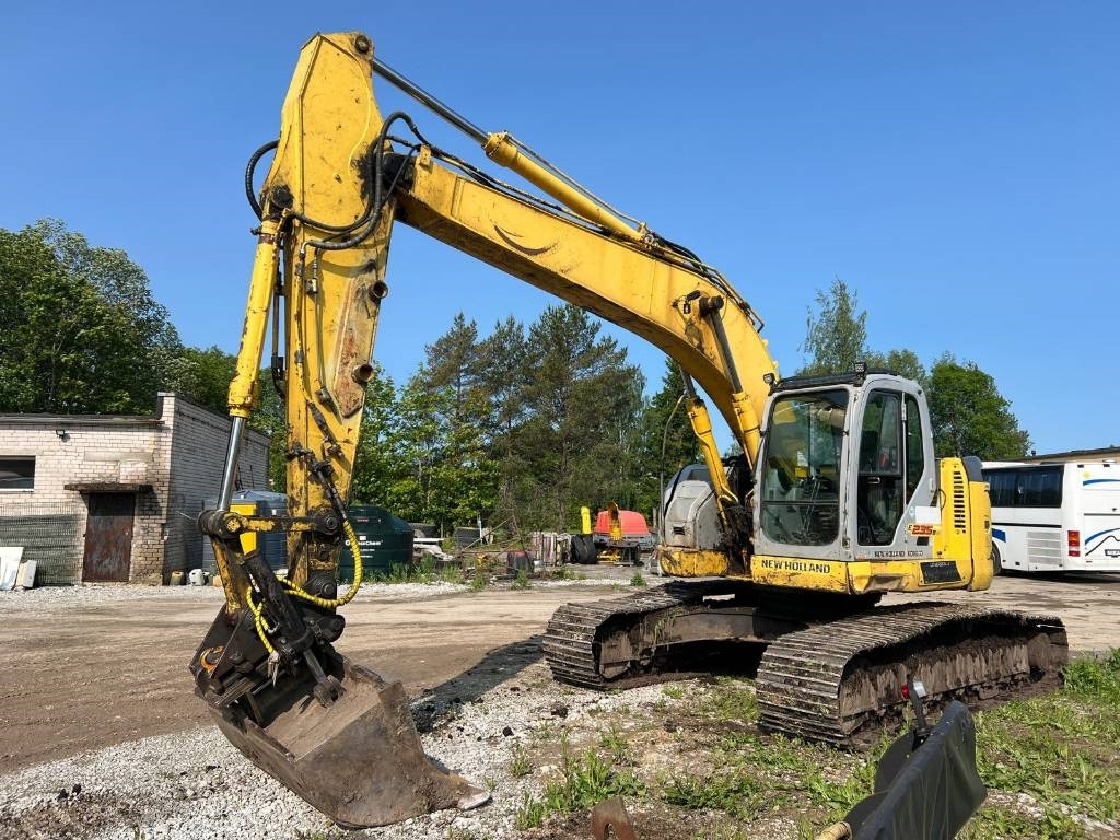 NEW HOLLAND KOBELCO E235BSRLC-2 - Máy xúc bánh xích: hình 1 NEW HOLLAND KOBELCO E235BSRLC-2 - Máy xúc bánh xích: hình 1