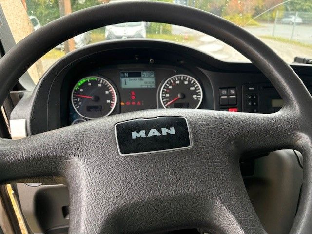 MAN 35.360 8x2 - Xe tải chở rác: hình 4 MAN 35.360 8x2 - Xe tải chở rác: hình 4
