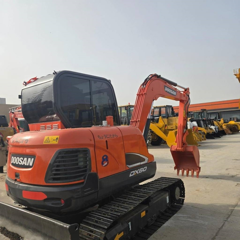 Doosan DX 60 - Máy xúc mini: hình 5 Doosan DX 60 - Máy xúc mini: hình 5