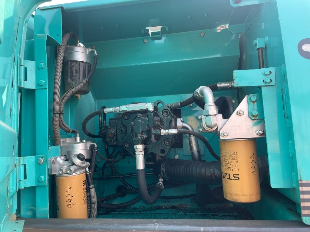 Kobelco SK 200 - Máy xúc bánh xích: hình 3 Kobelco SK 200 - Máy xúc bánh xích: hình 3