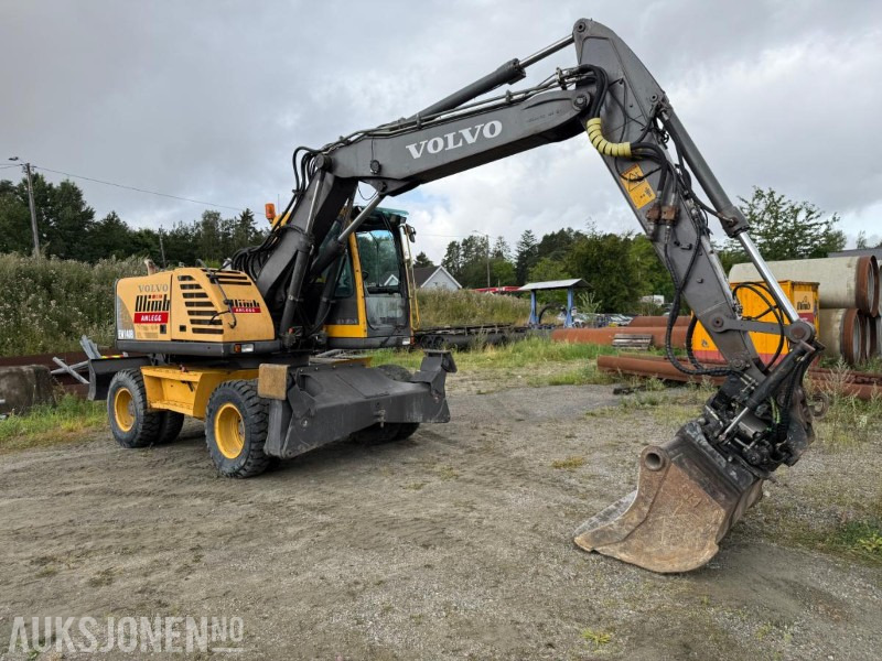 2006 Volvo EW140B Hjulgraver m/pallegaffel og skuff - Steelwrist tiltrotator. - Máy xúc: hình 2 2006 Volvo EW140B Hjulgraver m/pallegaffel og skuff - Steelwrist tiltrotator. - Máy xúc: hình 2
