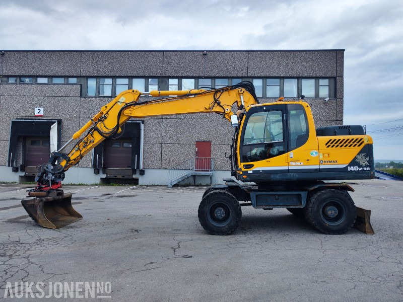2016 Hyundai R140W-9 hjulgraver med leddet bom, tiltrotator og pusseskuff - Máy xúc: hình 1 2016 Hyundai R140W-9 hjulgraver med leddet bom, tiltrotator og pusseskuff - Máy xúc: hình 1