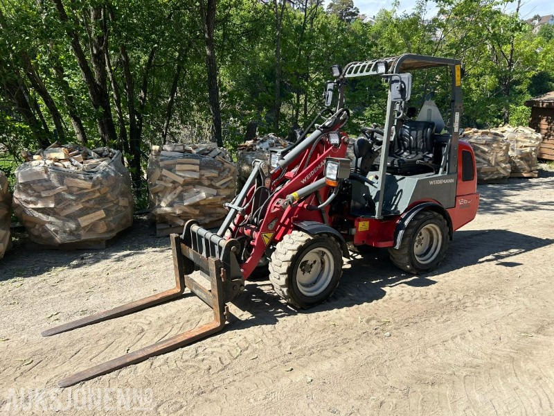 Weidemann 1260 CLASSIC HJULLASTER-PALLEGAFFEL-SKUFFE - Máy xúc lật bánh lốp: hình 1 Weidemann 1260 CLASSIC HJULLASTER-PALLEGAFFEL-SKUFFE - Máy xúc lật bánh lốp: hình 1