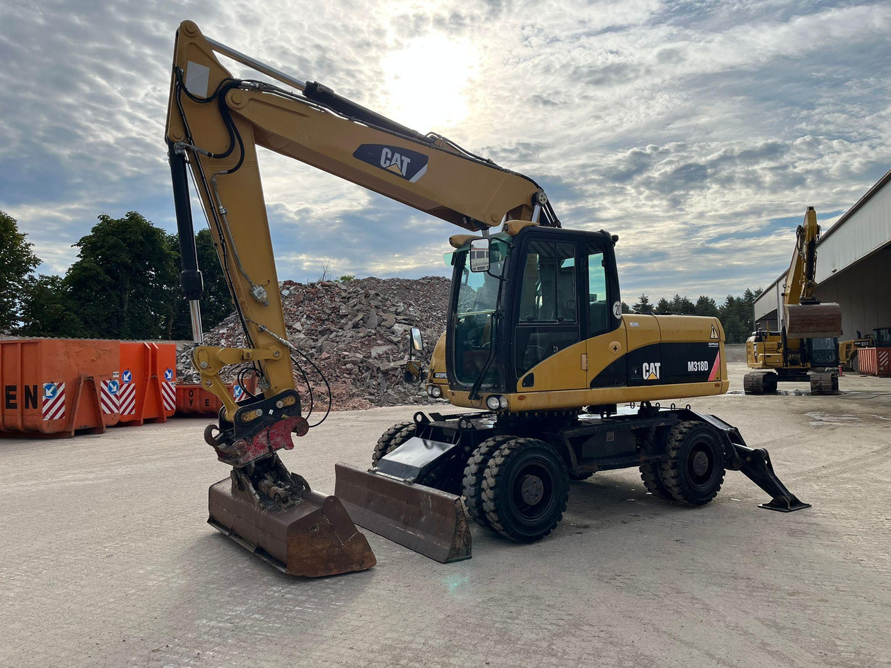 Caterpillar M318D - Máy xúc bánh lốp: hình 5 Caterpillar M318D - Máy xúc bánh lốp: hình 5
