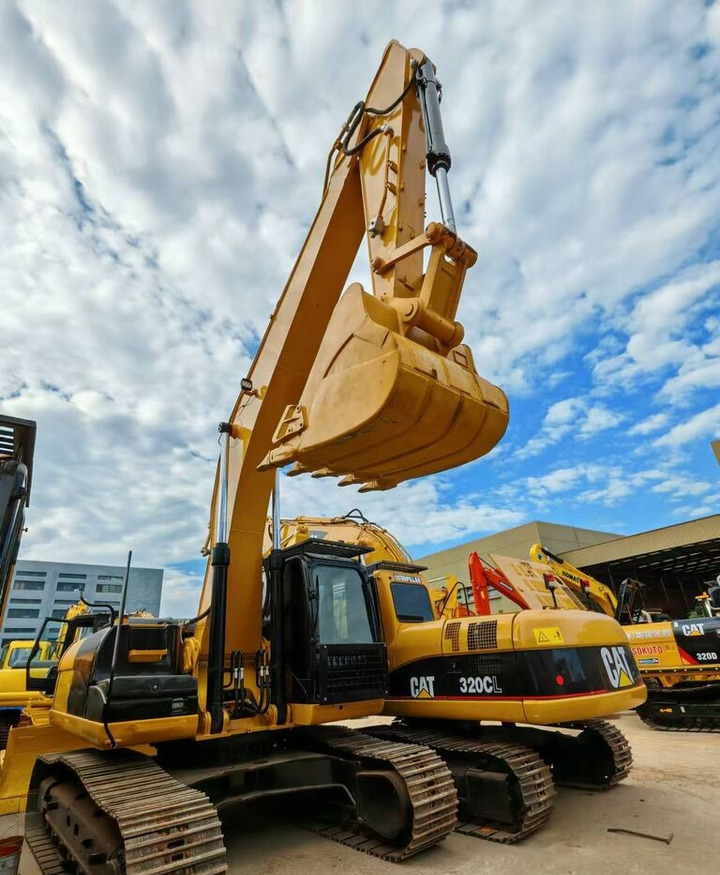 Caterpillar 320CL - Máy xúc bánh lốp: hình 1 Caterpillar 320CL - Máy xúc bánh lốp: hình 1
