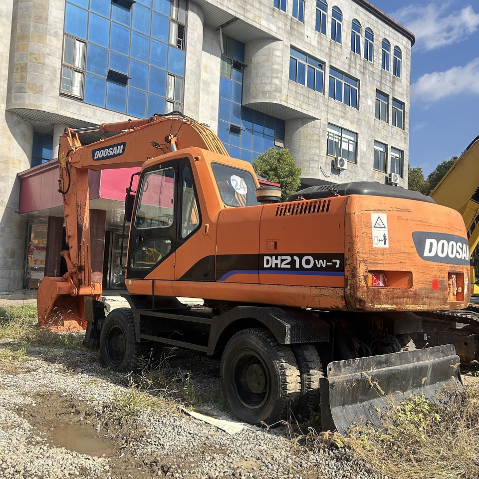 Doosan DH210w-7 wheel excavator - Máy xúc bánh lốp: hình 1 Doosan DH210w-7 wheel excavator - Máy xúc bánh lốp: hình 1