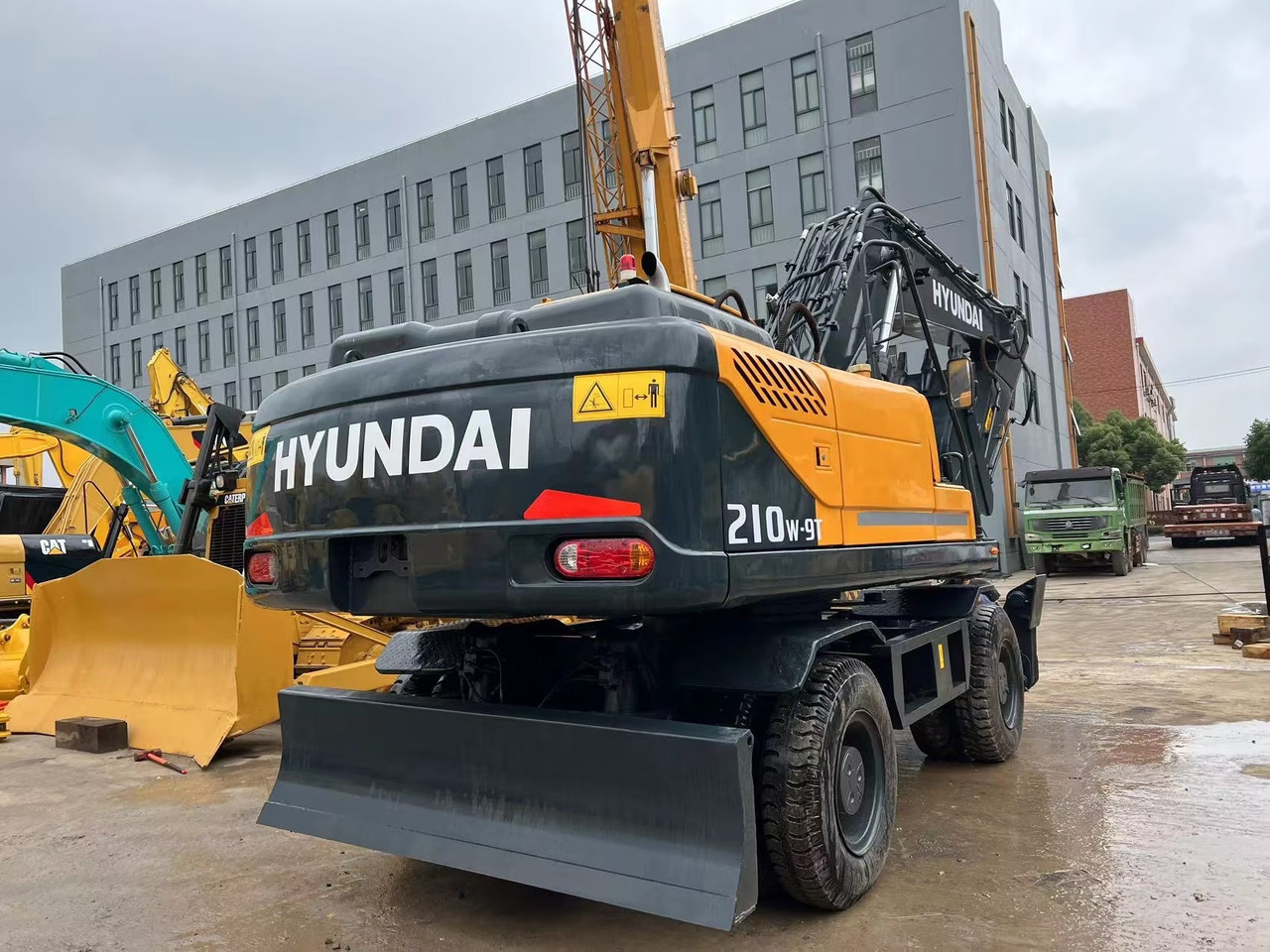 Hyundai 210w-9 wheel excavator - Máy xúc bánh lốp: hình 5 Hyundai 210w-9 wheel excavator - Máy xúc bánh lốp: hình 5