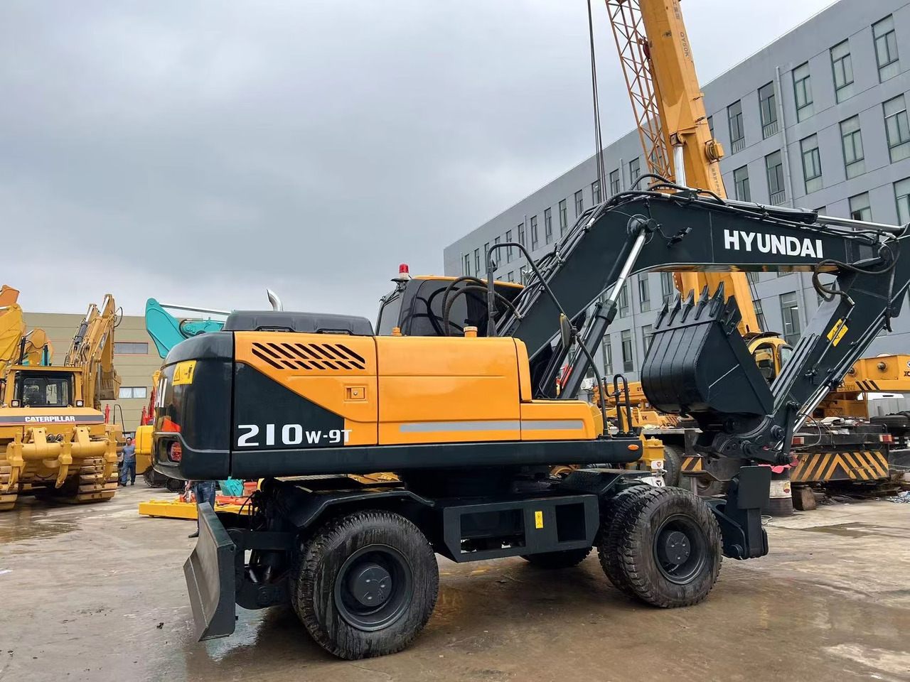Hyundai 210w-9 wheel excavator - Máy xúc bánh lốp: hình 2 Hyundai 210w-9 wheel excavator - Máy xúc bánh lốp: hình 2