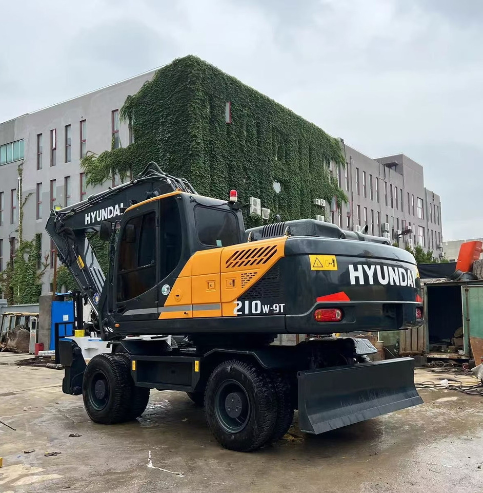 Hyundai 210w-9 wheel excavator - Máy xúc bánh lốp: hình 1 Hyundai 210w-9 wheel excavator - Máy xúc bánh lốp: hình 1