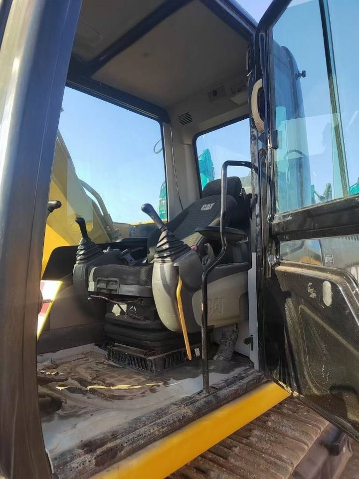 CAT 318 - Máy xúc bánh xích: hình 4 CAT 318 - Máy xúc bánh xích: hình 4