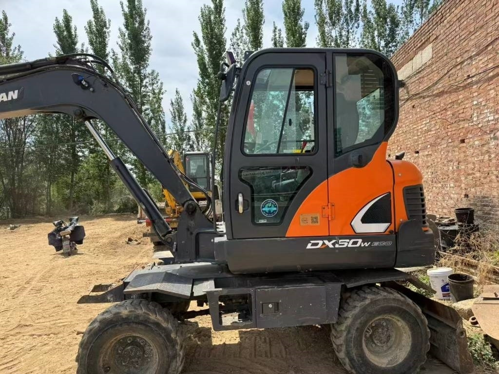 Doosan DX 60 - Máy xúc mini: hình 5 Doosan DX 60 - Máy xúc mini: hình 5