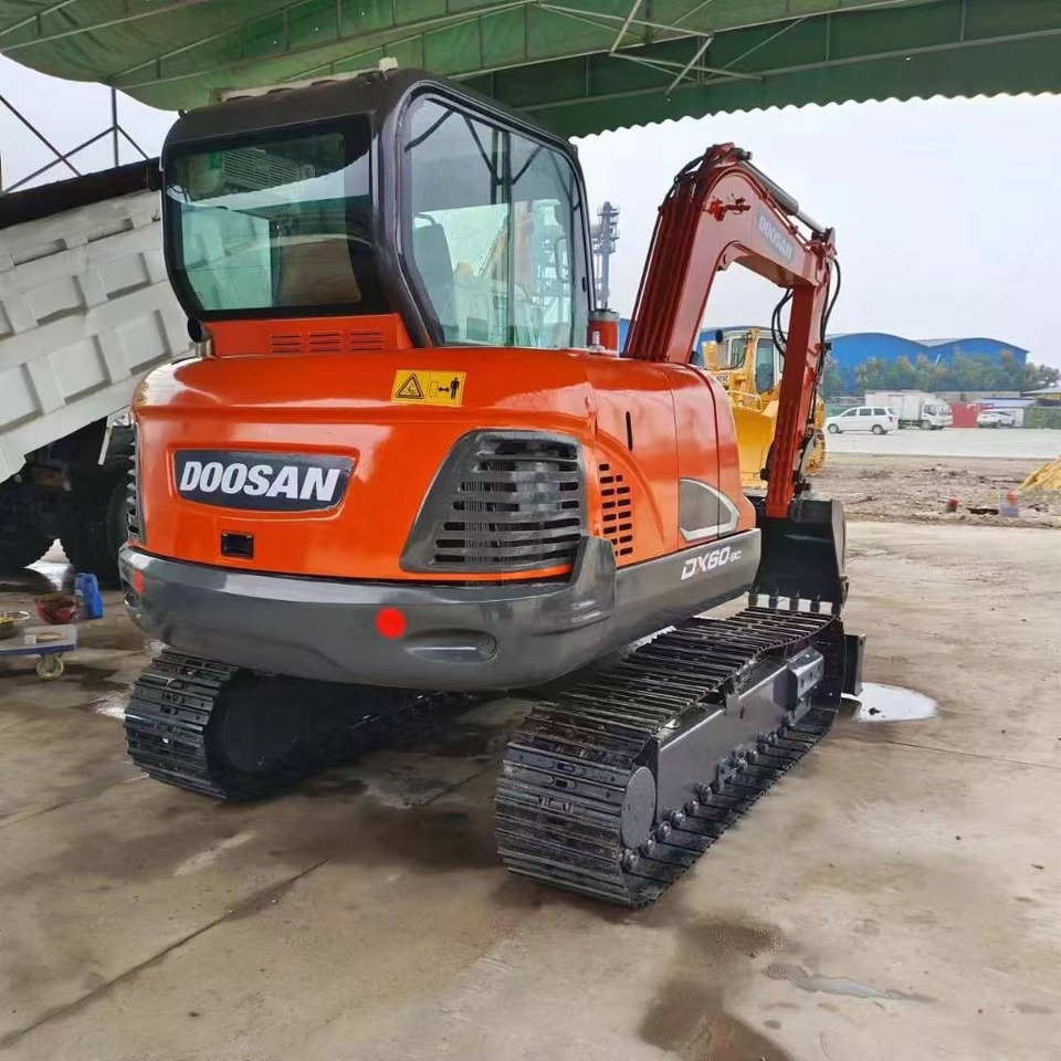Doosan DX 60 - Máy xúc mini: hình 1 Doosan DX 60 - Máy xúc mini: hình 1