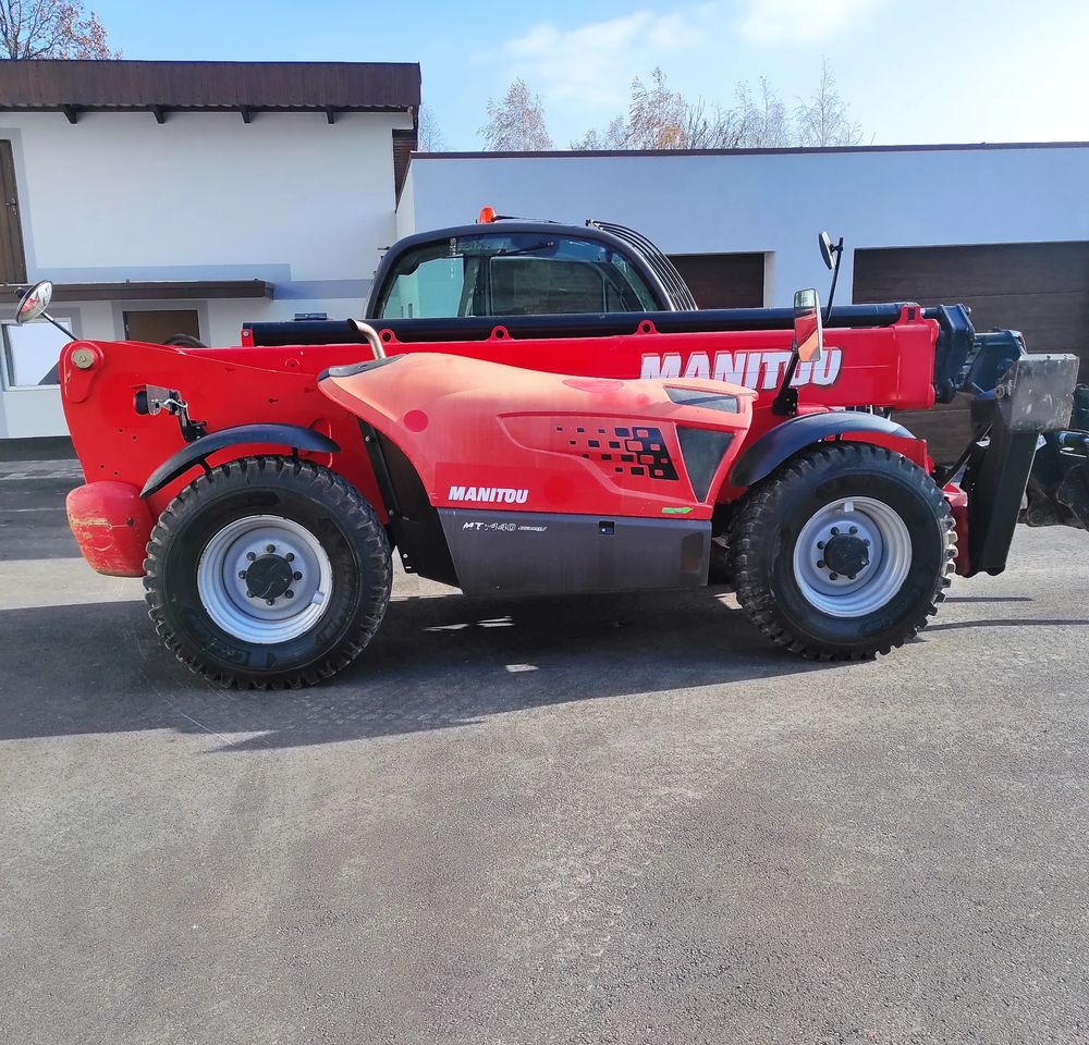 Manitou 1440 - Xe nhấc hình viễn vọng kính: hình 1 Manitou 1440 - Xe nhấc hình viễn vọng kính: hình 1