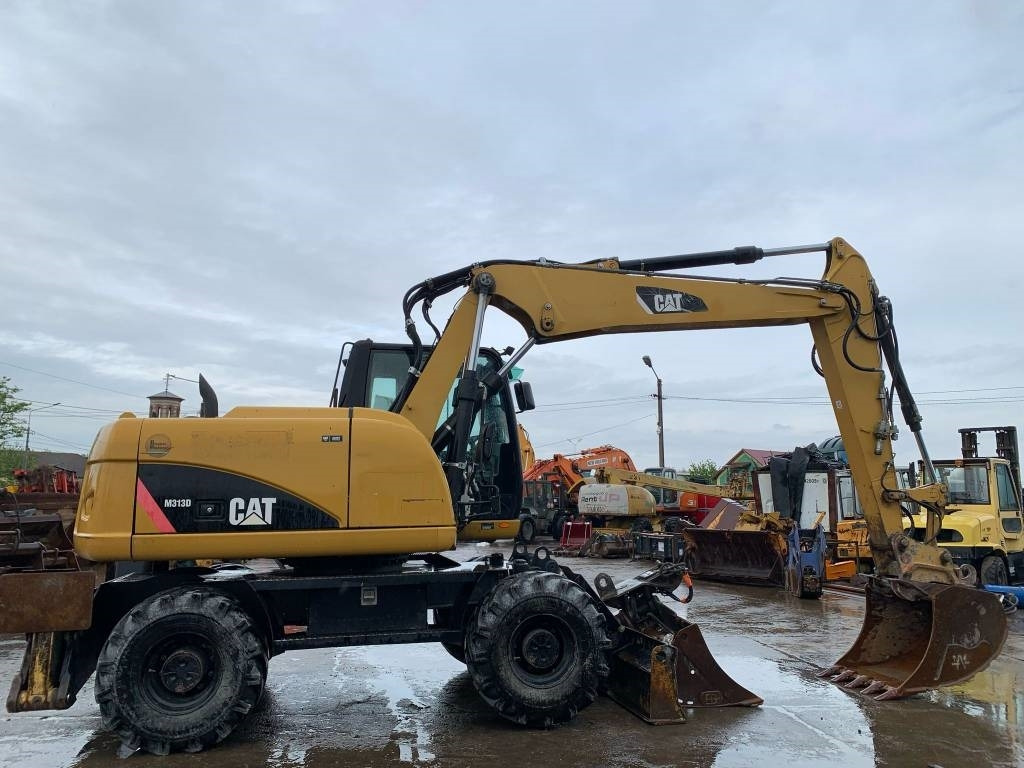 CAT M 313 D - Máy xúc bánh lốp: hình 5 CAT M 313 D - Máy xúc bánh lốp: hình 5
