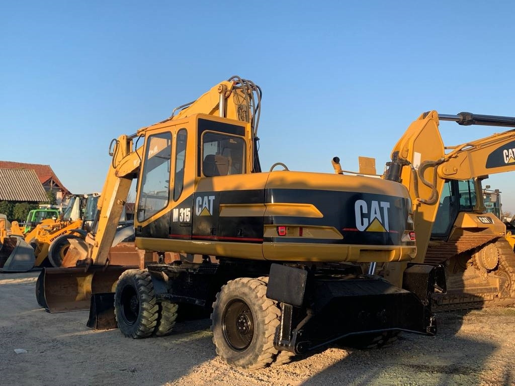 CAT M 315 - Máy xúc bánh lốp: hình 4 CAT M 315 - Máy xúc bánh lốp: hình 4